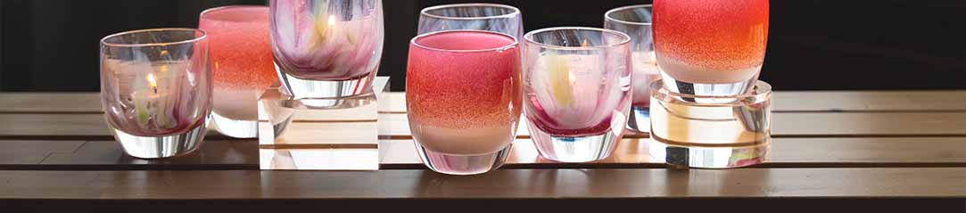 acrylic baby stands in square and round. Paired with your love and prima, hand-blown glass votive candle holders.