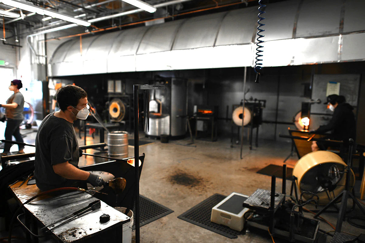 glassbowers making hand-blown glass votive candle holders