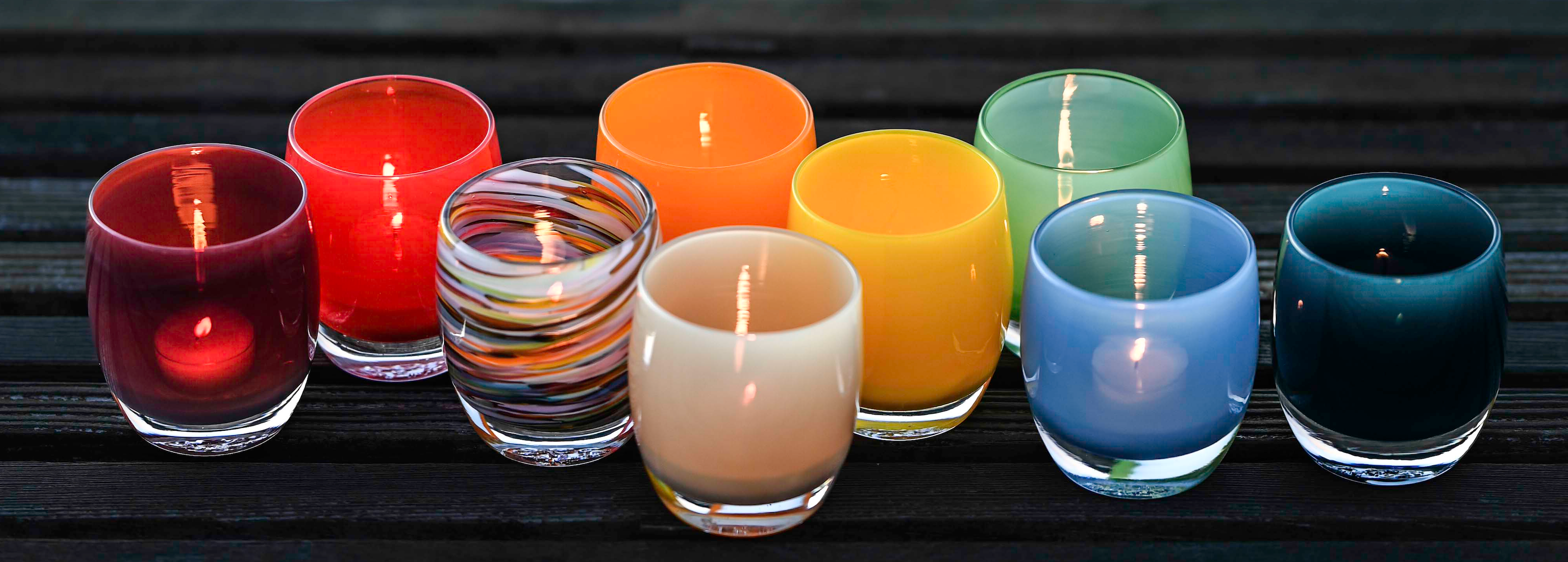 colorful spectrum of hand-made glass votive candle holders