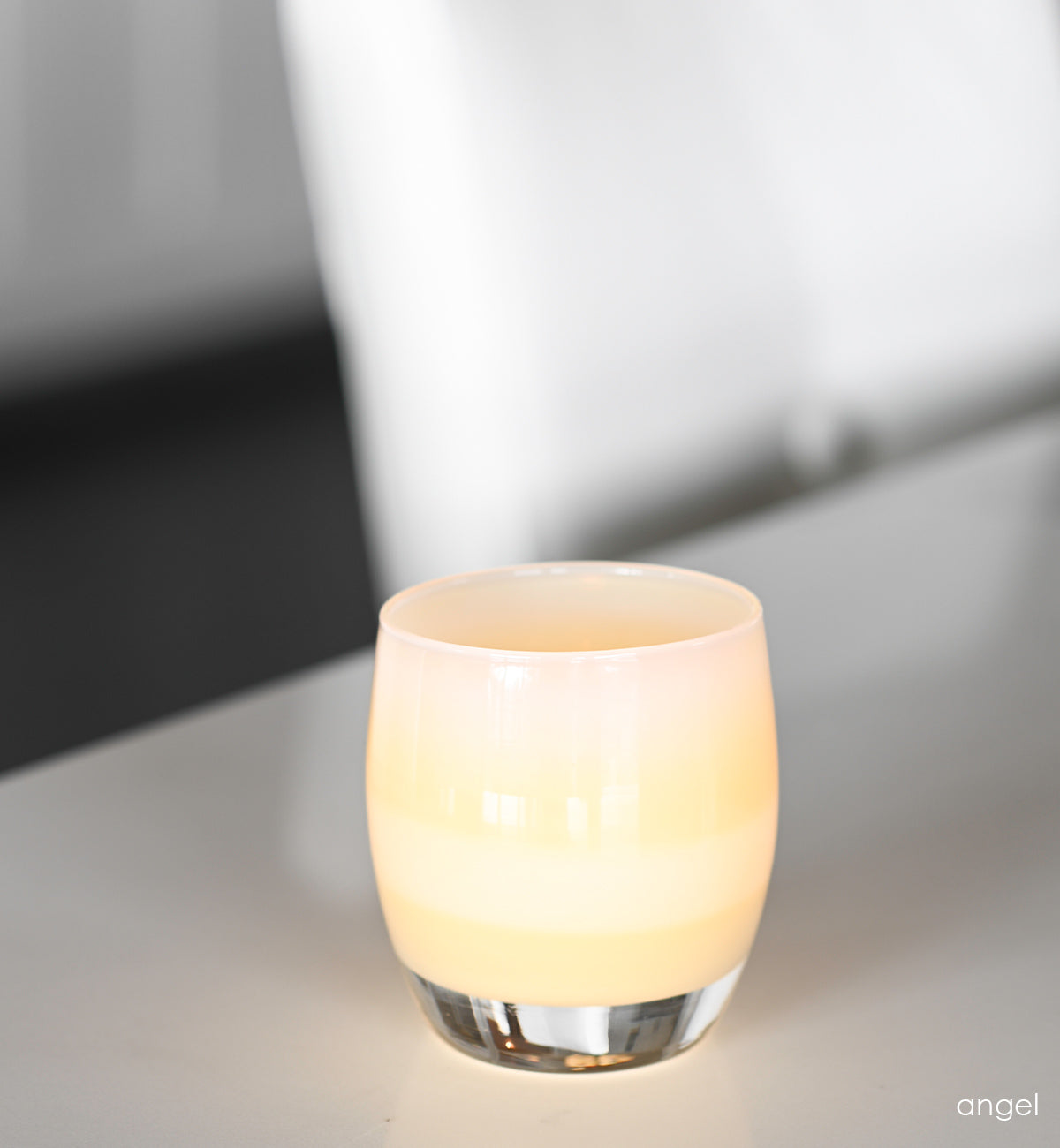 angel light yellow, hand-blown glass votive candle holder