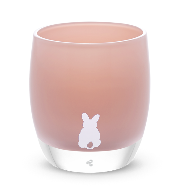 bunny tail - azalea pink hand-blown candle holder with white bunny tail.