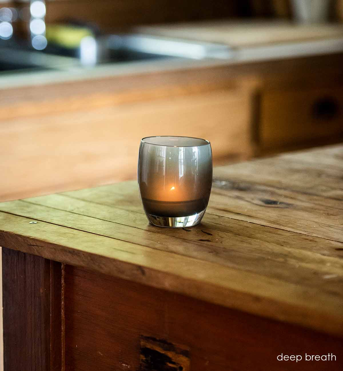 deepbreath smokey grey, hand-blown glass votive candle holder.