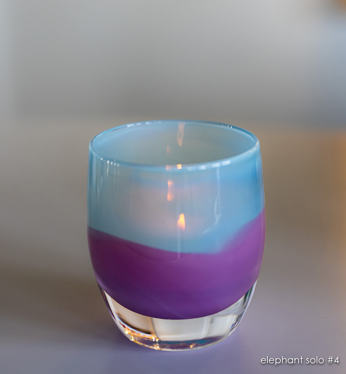 elephant solo #4 turquoise/purple hand-blown glass candle holder.