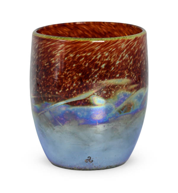 campfire is a textured brown and red hand-blown glass votive candle holder.