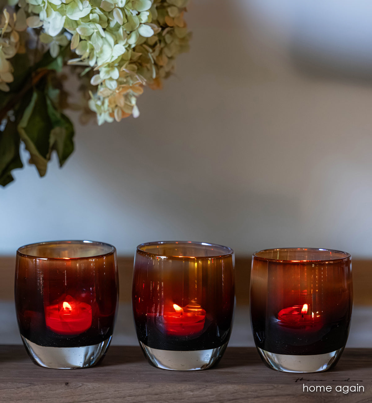 three home again glassybaby: brown gradient hand-blown glass votive candle holders.