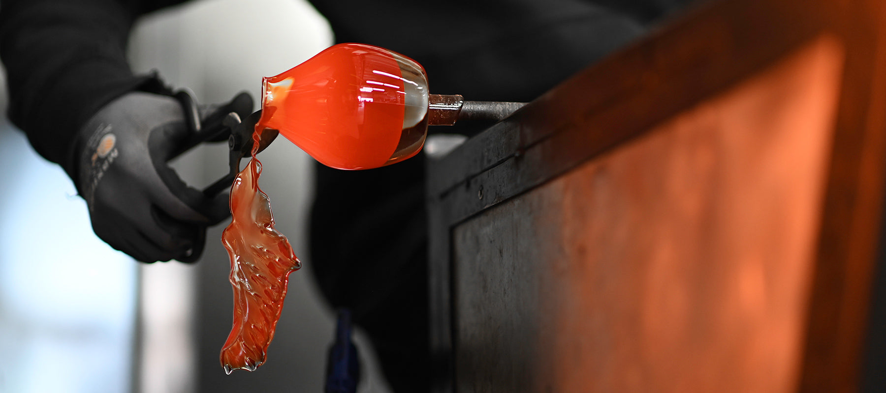 trimming hand-blown glass votive candle holder