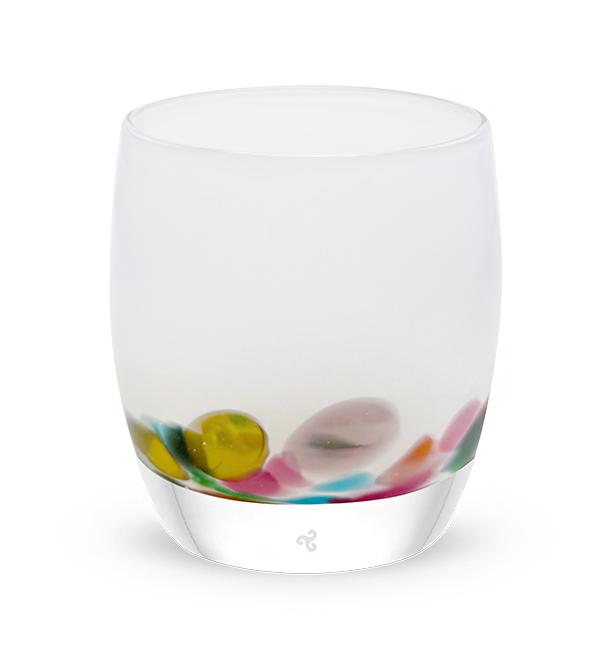 mahalo, white with multi-colored yellow, pink, teal, purple and green petals hand-blown glass votive candle holder.