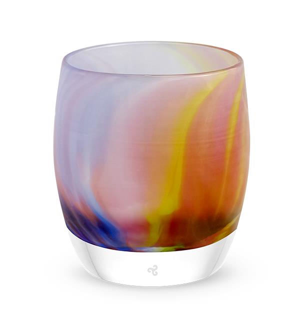 A multicolored glass candle holder with a design that resembles a rainbow