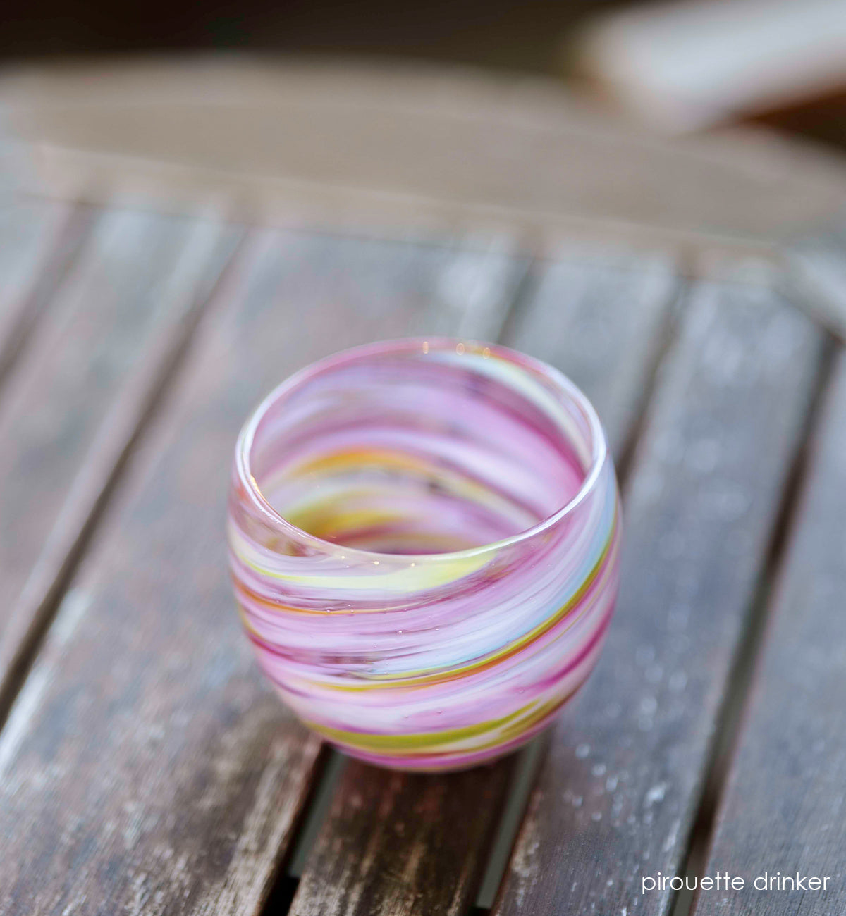 pirouette pink multi-colored swirl, hand-blown drinking glass.