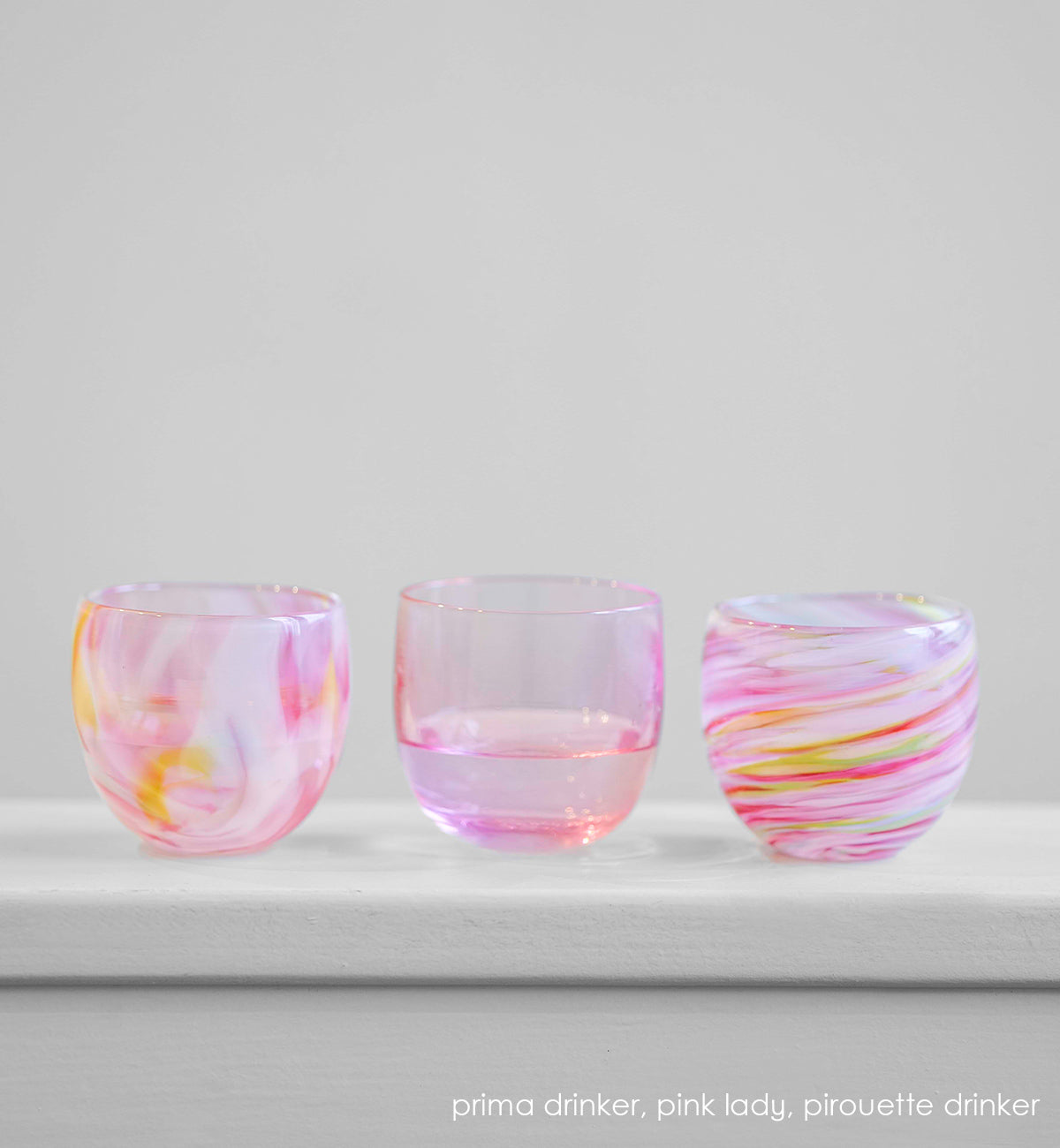 prima pink multi-colored petal, pink lady transparent pink, pirouette pink multi-colored swirl, hand-blown drinking glass