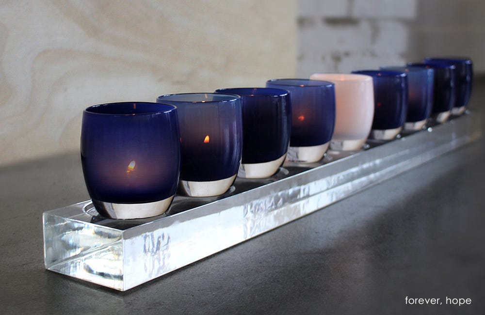 clear baby train™ nine well stand for hand-blown glass votive candle holders, paired with forever and hope