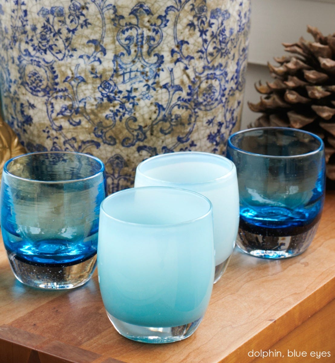 blue eyes transparent crystal blue hand-blown glass votive candle holder. Paired with dolphin.