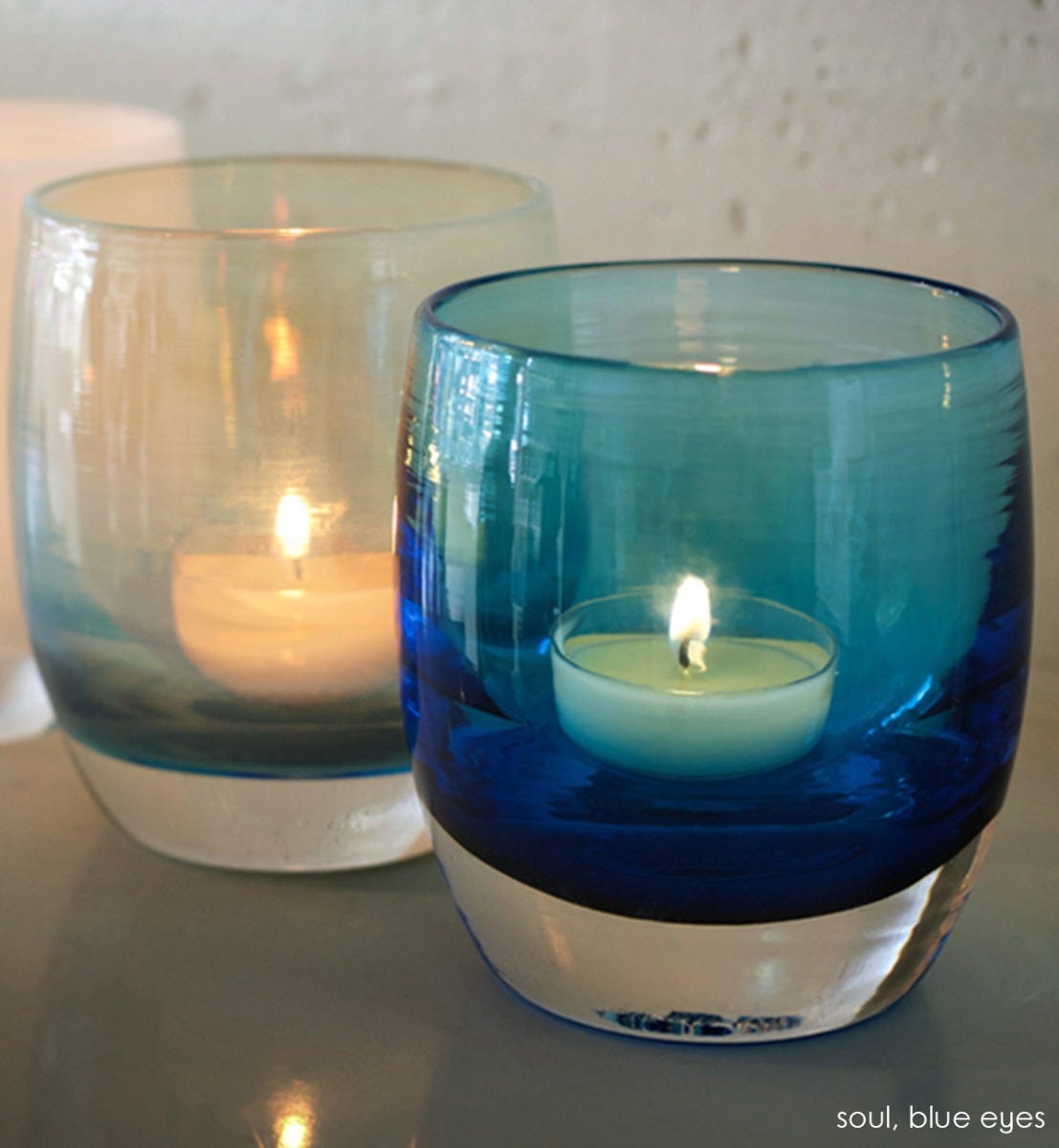 blue eyes transparent crystal blue hand-blown glass votive candle holder. Paired with soul.