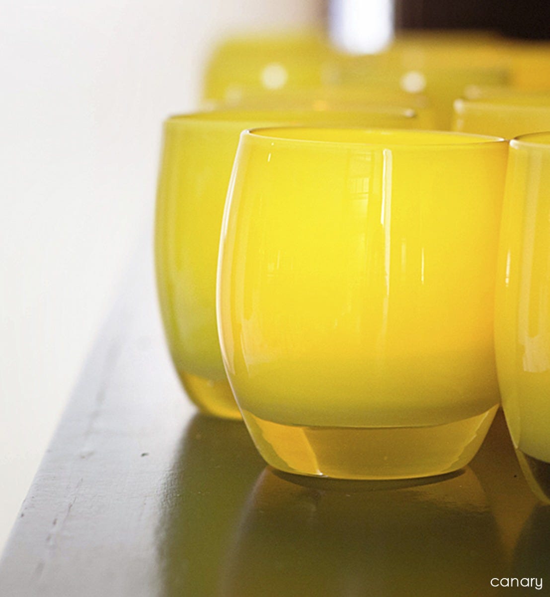 canary yellow hand-blown glass votive candle holder