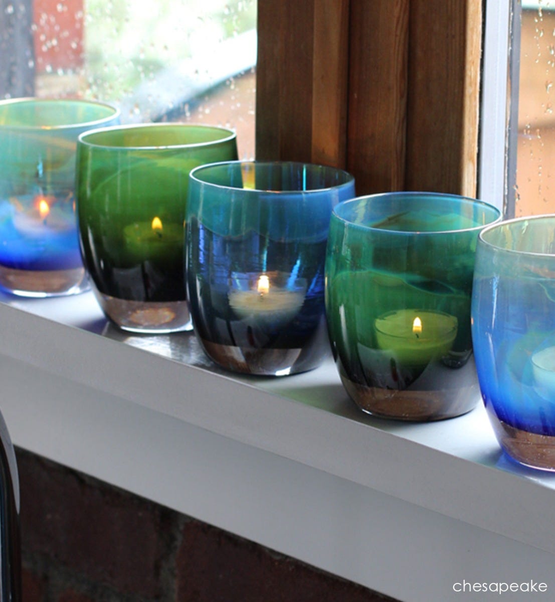chesapeake dark green with touch of yellow hand-blown glass votive candle holder.