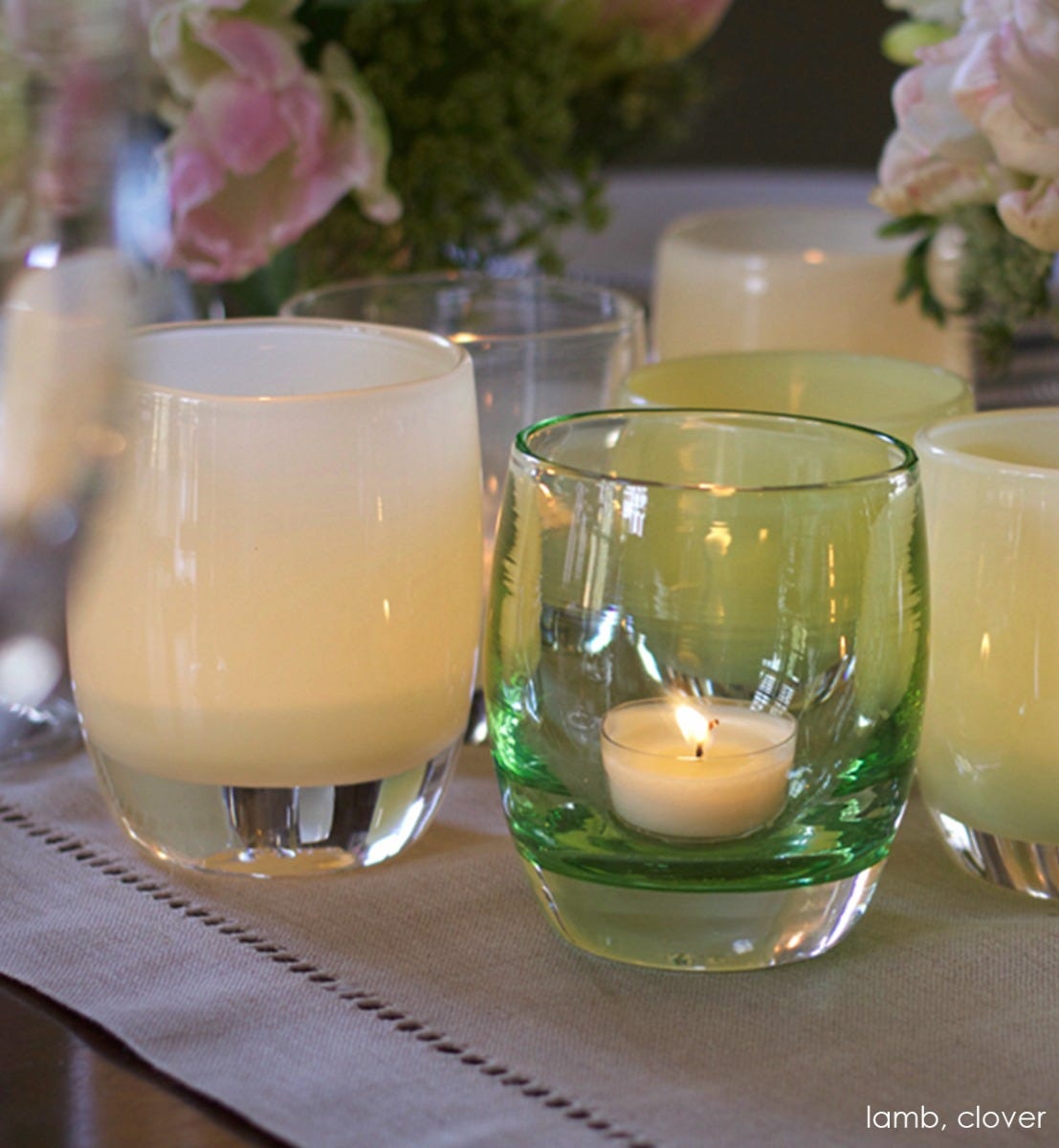 clover transparent light green hand-blown glass votive candle holder. Paired with lamb.