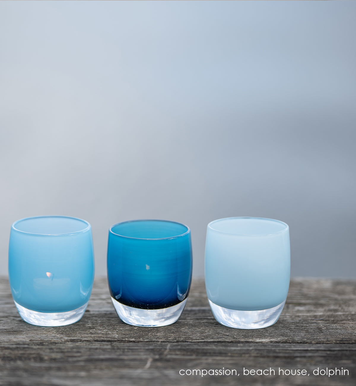 compassion powder blue, hand-blown glass votive candle holder.