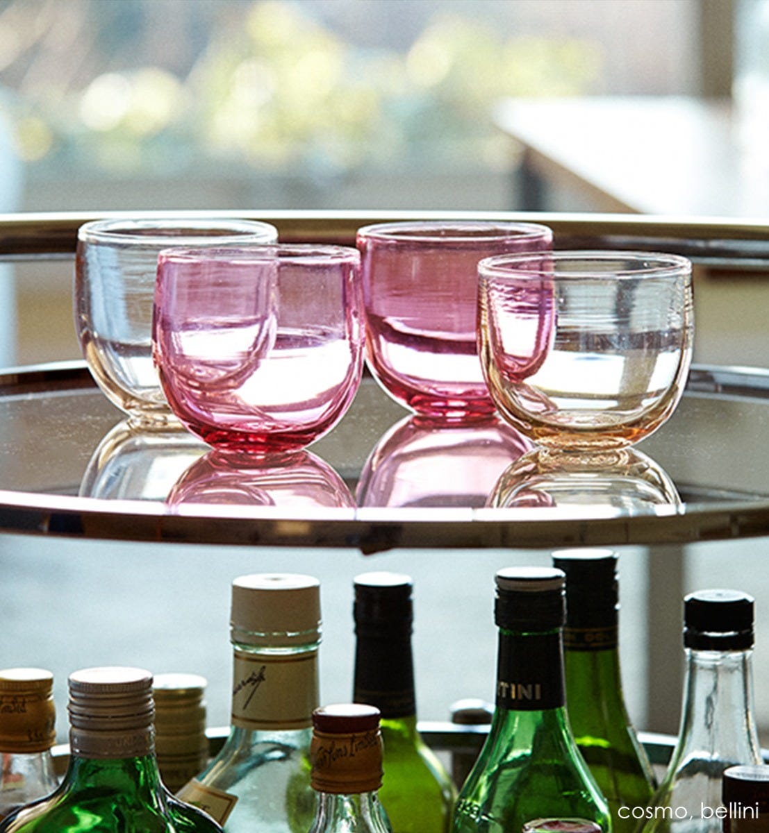 cosmo drinker, transparent pink, hand-blown drinking glass. Paired with bellini drinker