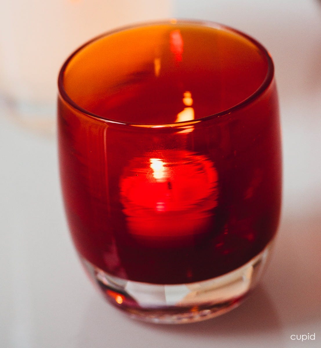 cupid transparent red hand-blown glass votive candle holder