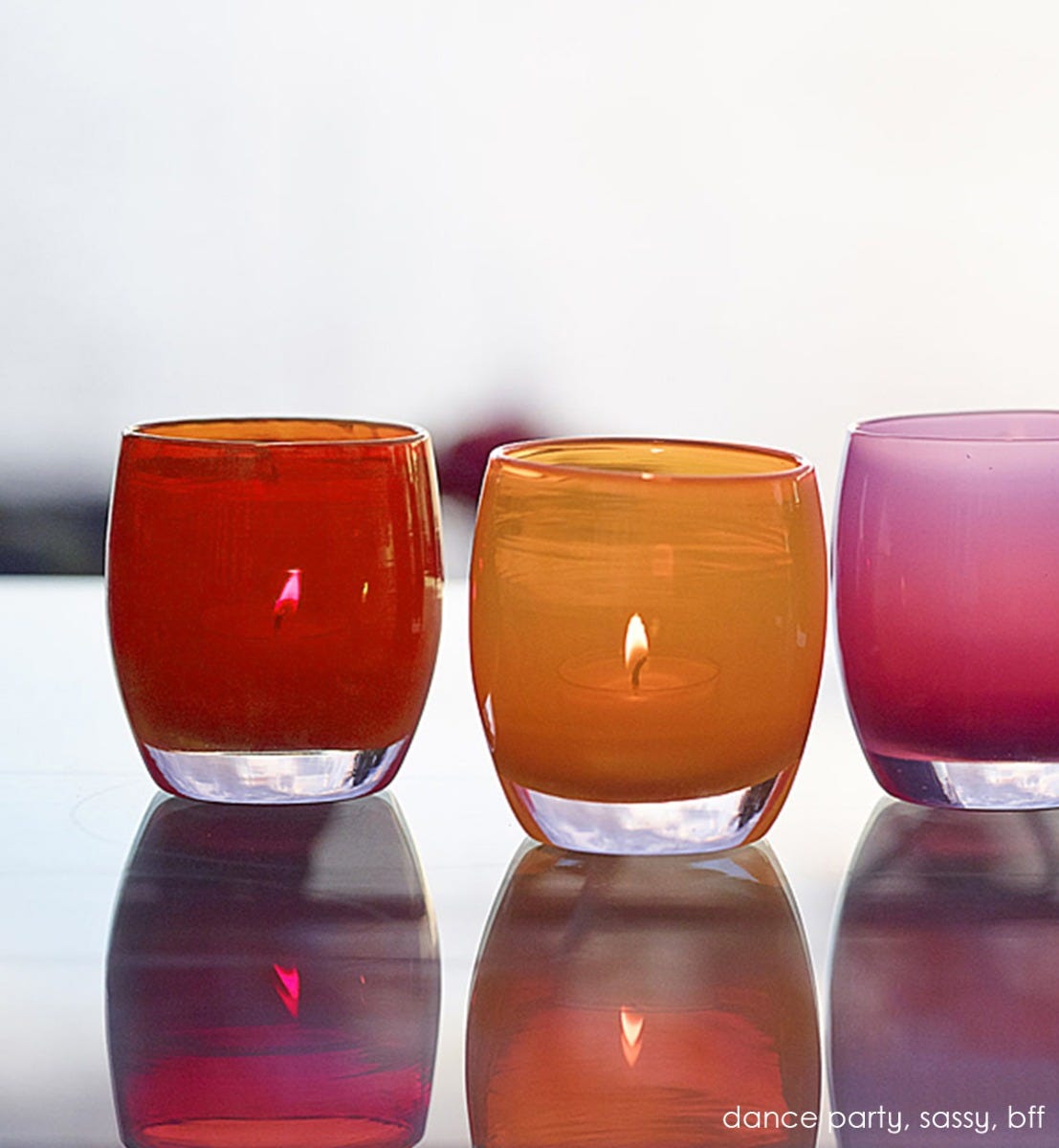 dance party ginger red, hand-blown glass votive candle holder. paired with sassy and bff