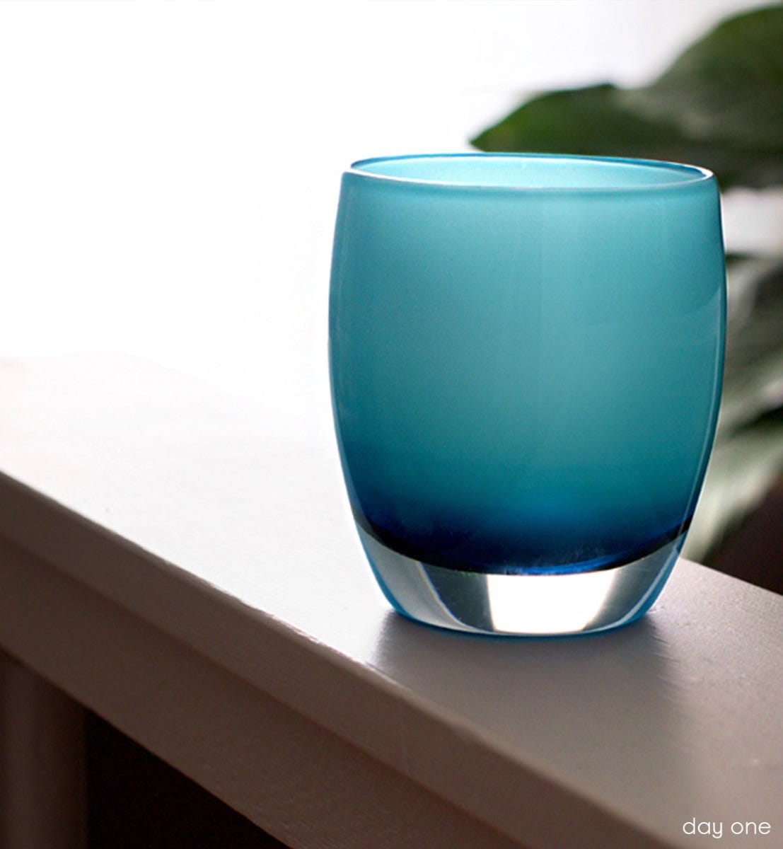 day one, bright blue with white interior, hand-blown glass votive candle holder.