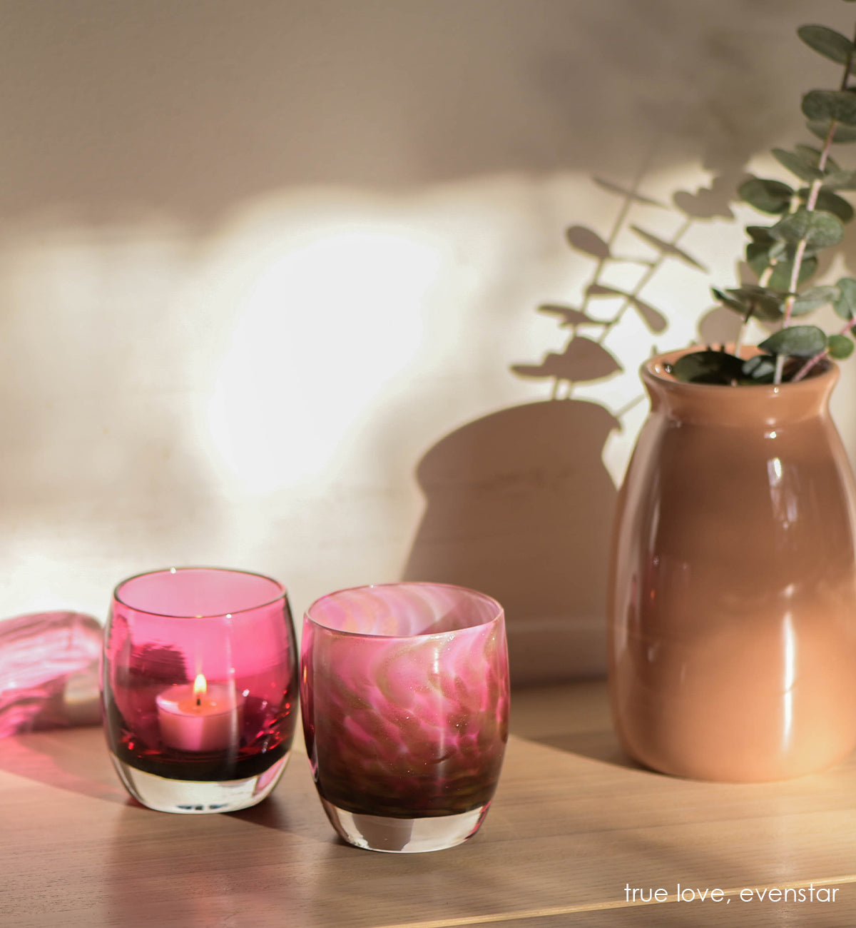 evenstar and true love hand-blown glass candle holder votive on table