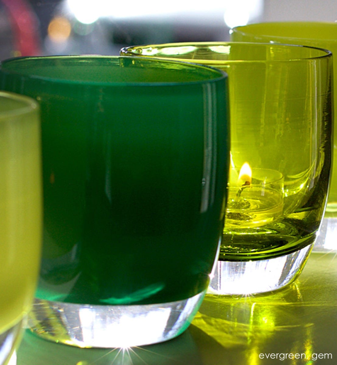evergreen hand-blown glass votive candle holder. Paired with gem.