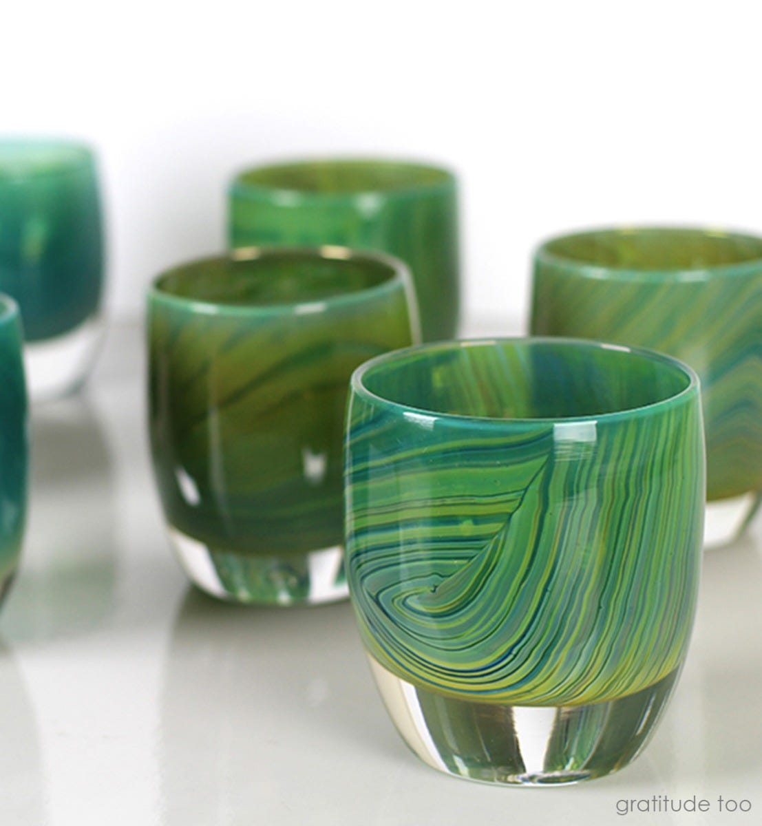 gratitude too, textured translucent teal green with silver luster, hand-blown glass votive candle holder