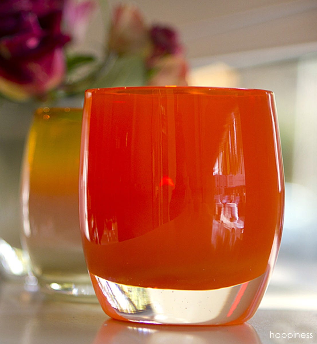 happiness scarlet red hand-blown glass votive candle holder.
