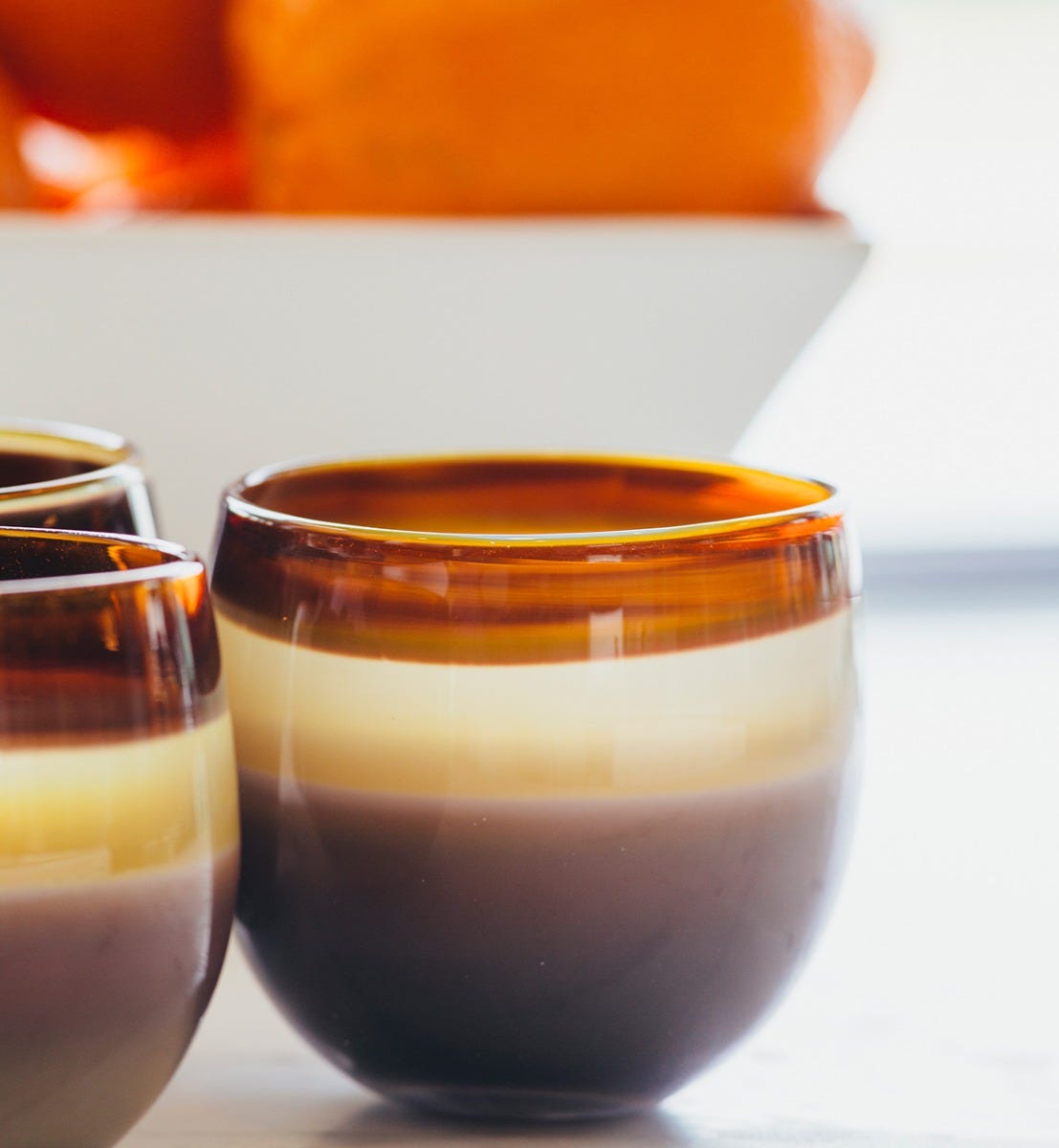 hot toddy drinker, brown and purple toned hand-blown drinking glass