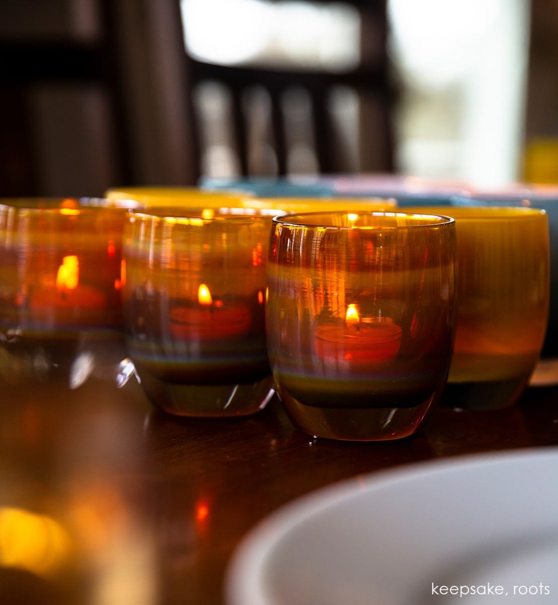 keeepsake golden amber with gold metallic interior hand-blown glass votive candle holder. Paired with roots.