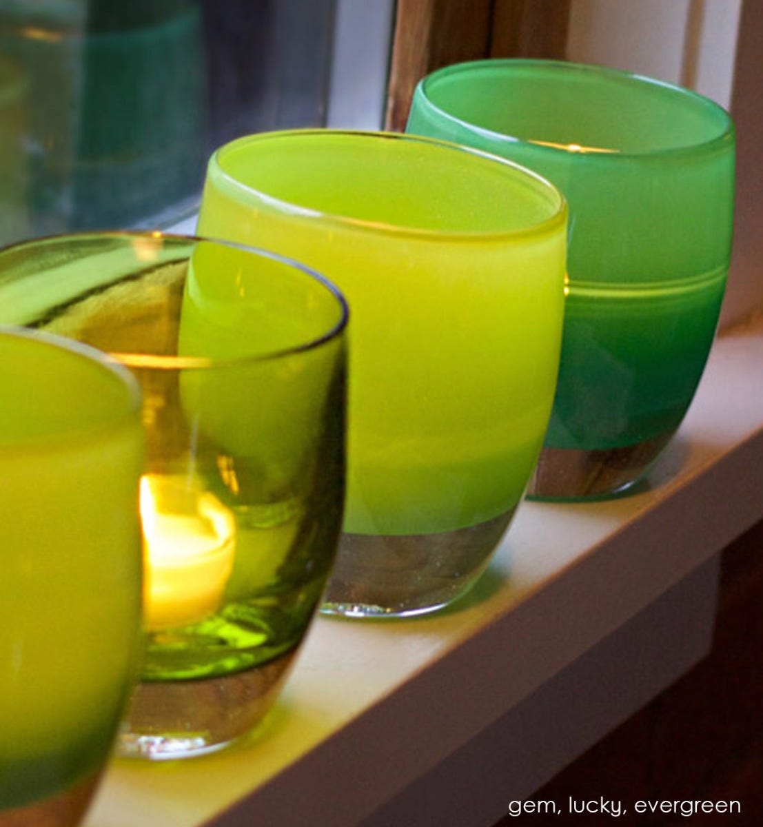 lucky lime green hand-blown glass votive candle holder. Paired with evergreen and gem.