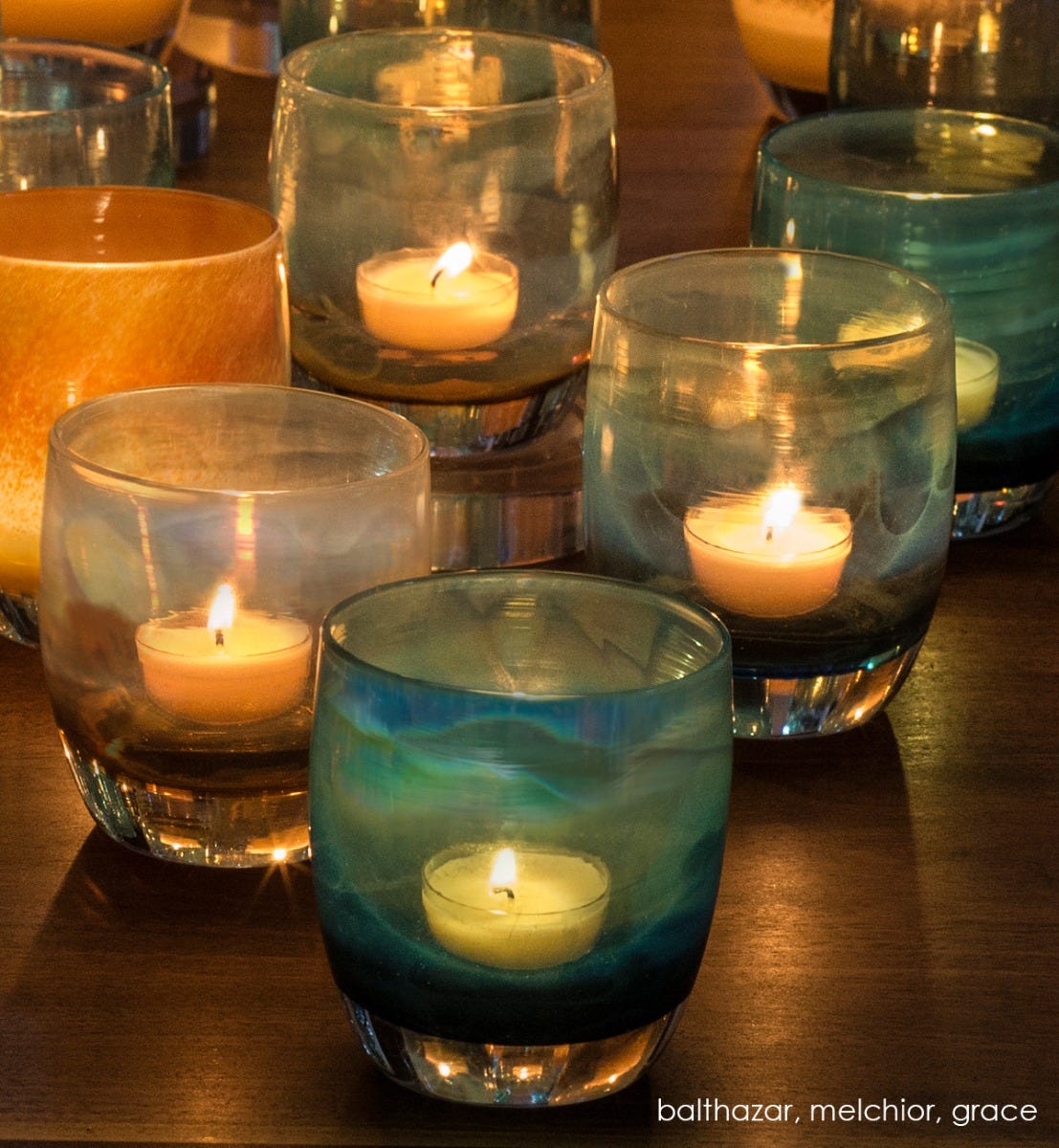 melchior shiny purple gray transparent, balthazar shiny blue transparent, grace gold topped white, hand-blown glass votive candle holder