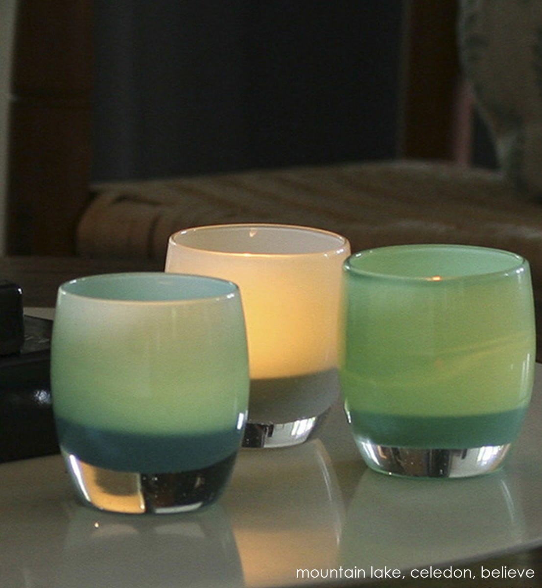 mountain lake blue hand-blown glass votive candle holder. Paired with celadon and believe.