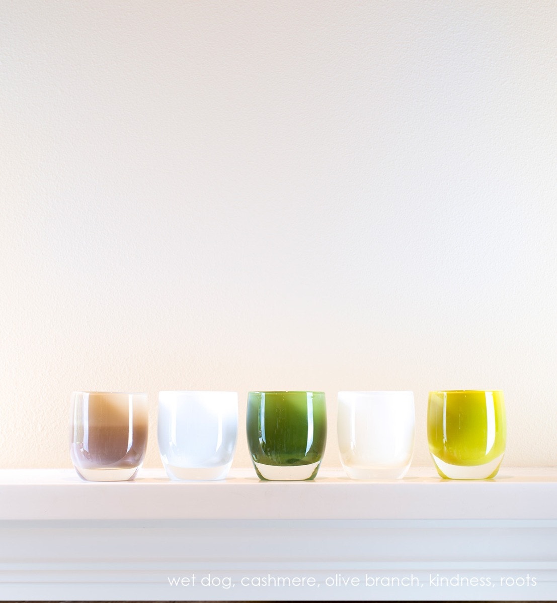 olive branch, green olive hand-blown glass votive candle holder. Paired with wet dog, cashmere, kindness, and roots.