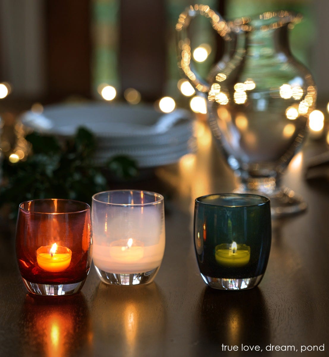pond transparent dark evergreen hand-blown glass votive candle holder. Paired with true love and dream.