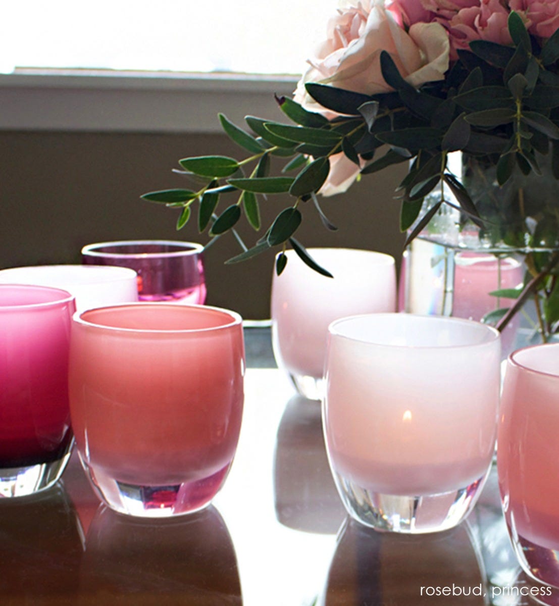 princess soft pink hand-blown glass votive candle holder. Paired with rosebud.