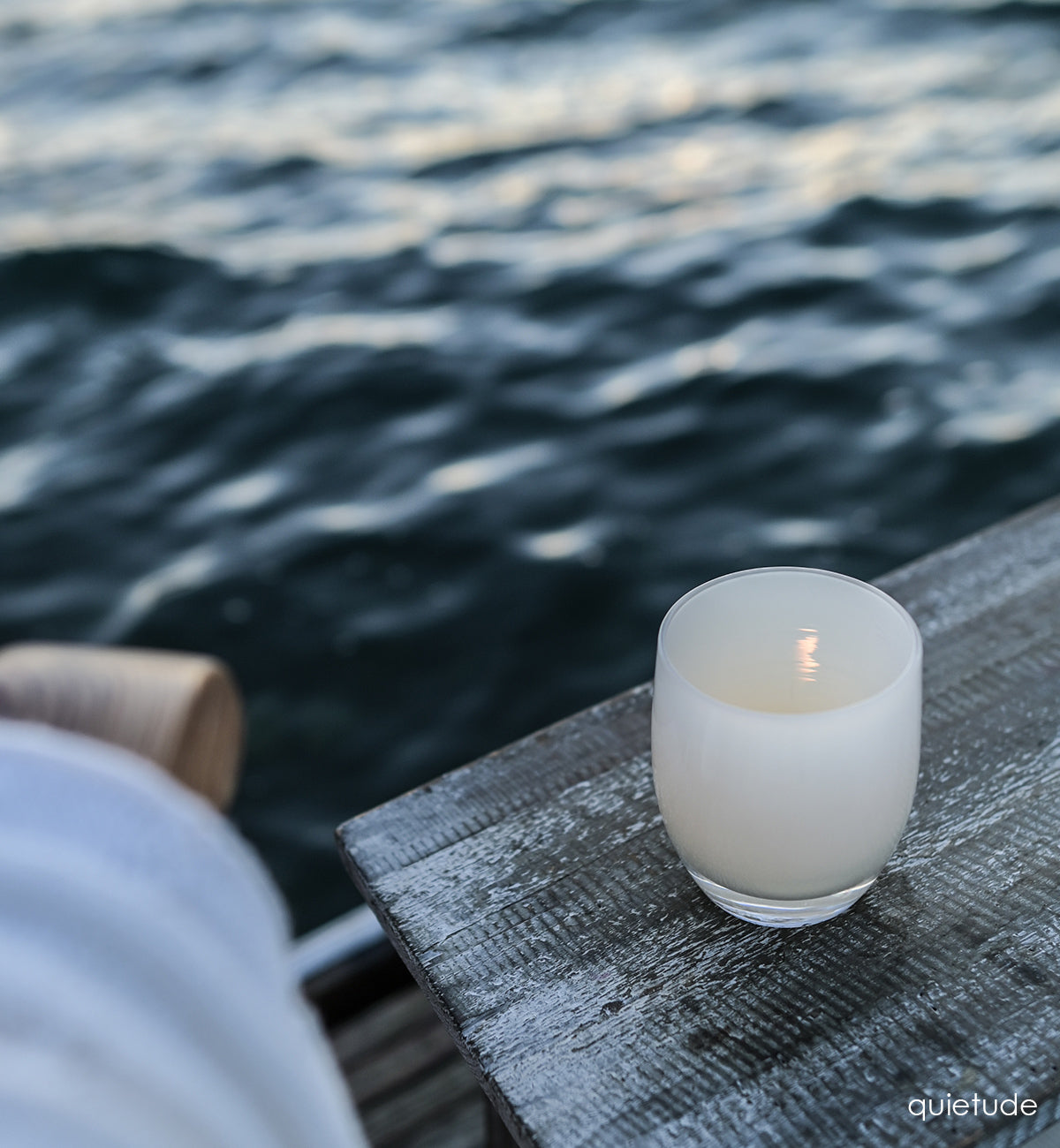 quietude cream hand-blown glass votive candle holder.