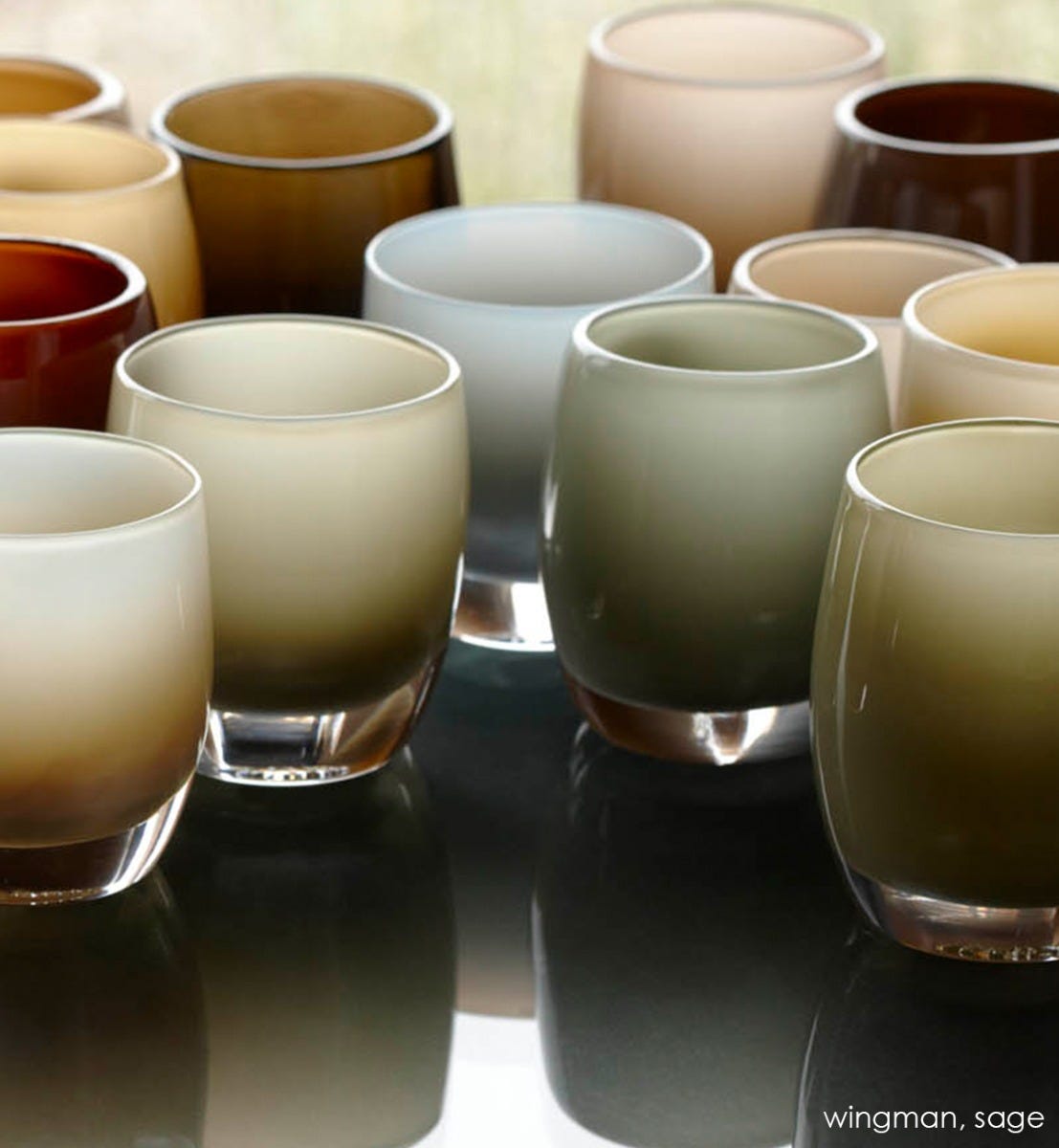 sage green hand-blown glass votive candle holder. Paired with wingman.