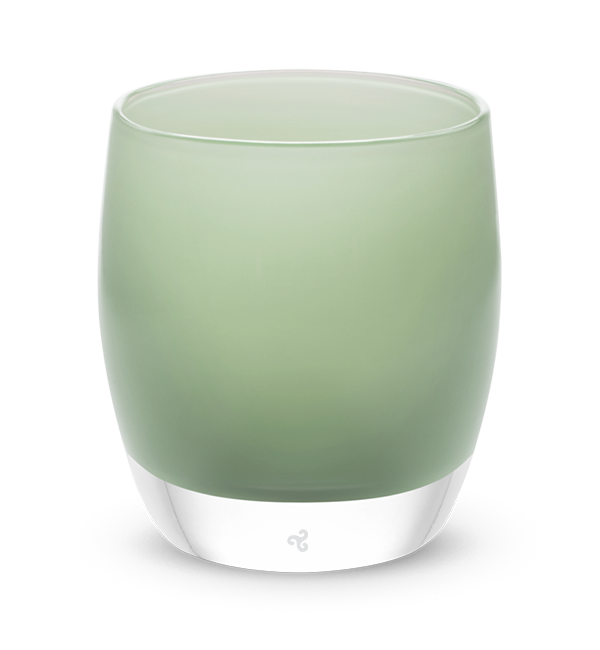 hand-blown sage green glass votive candle holder.