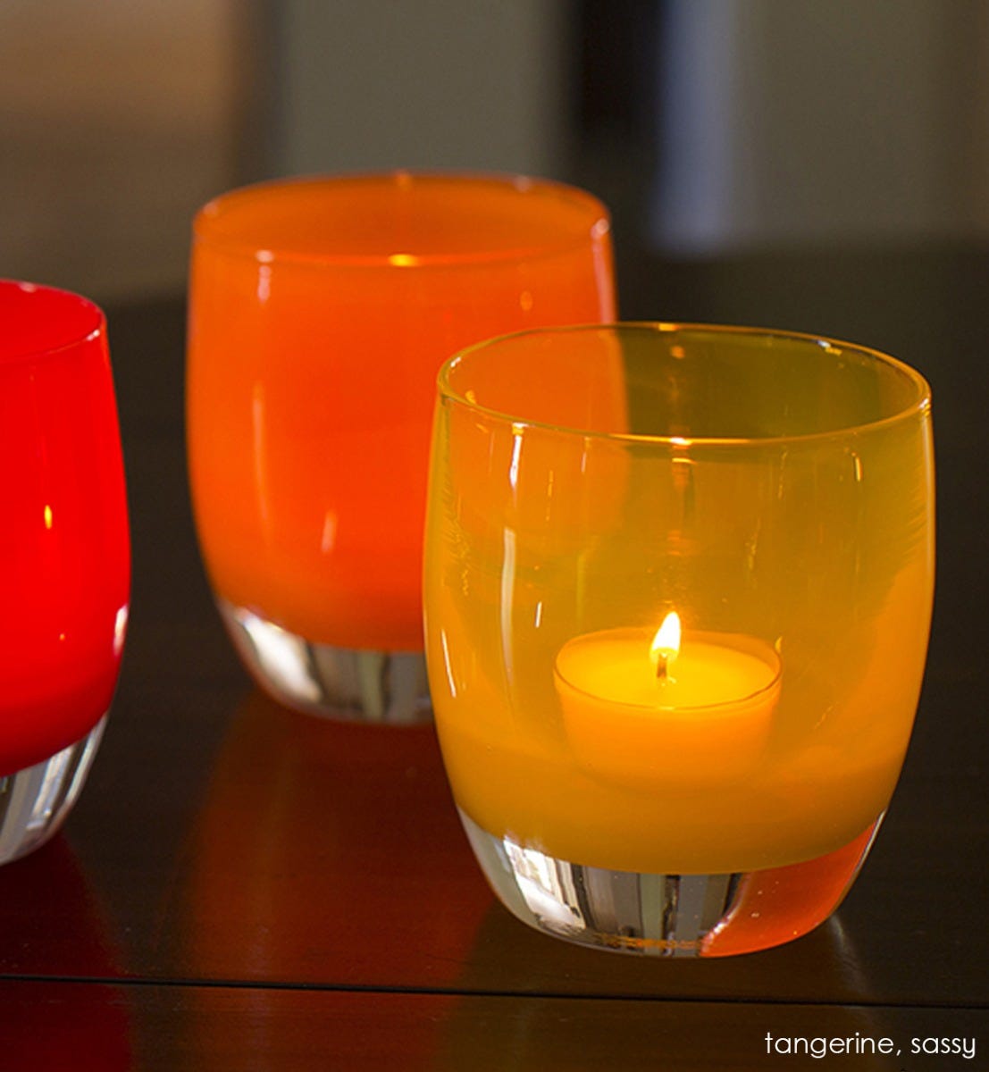 sassy bright orange yellow hand-blown glass votive candle holder. Paired with tangerine.