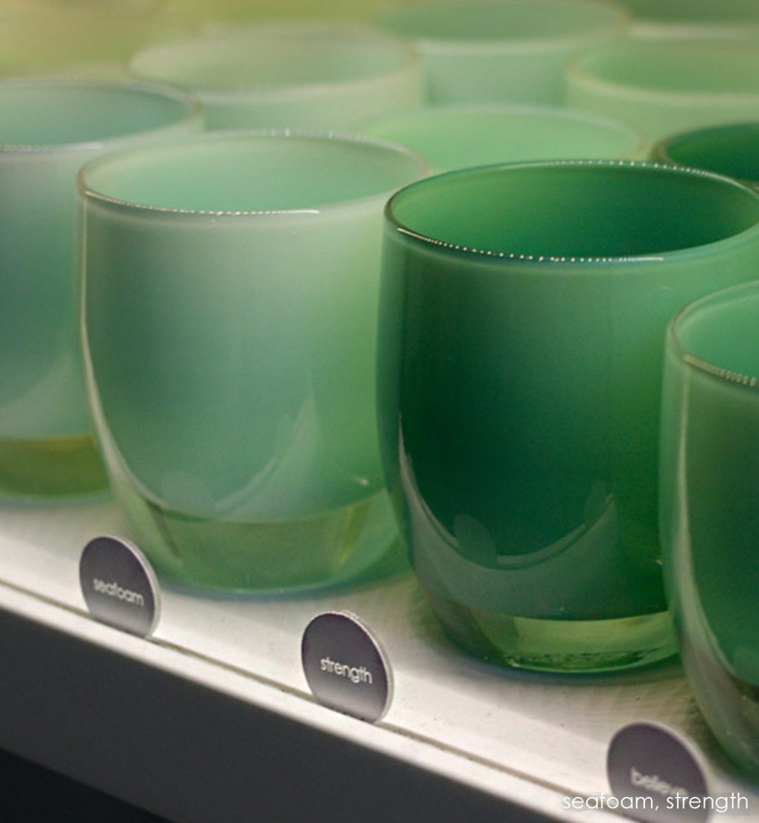 sea foam green hand-blown glass votive candle holder. Paired with strength.