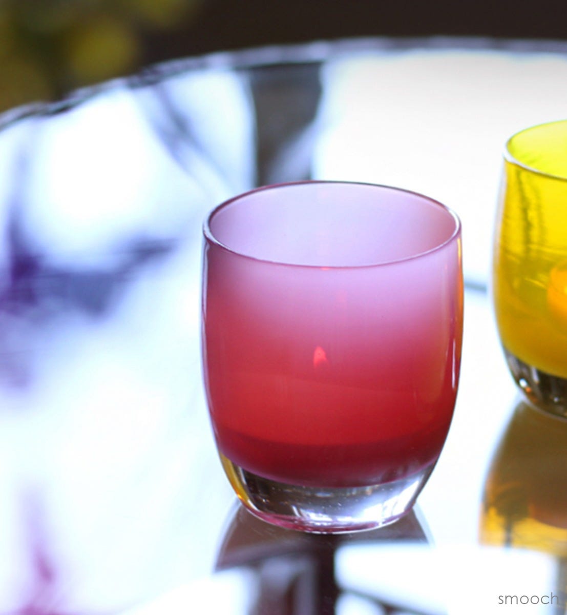 smooch deep pink hand-blown glass votive candle holder.