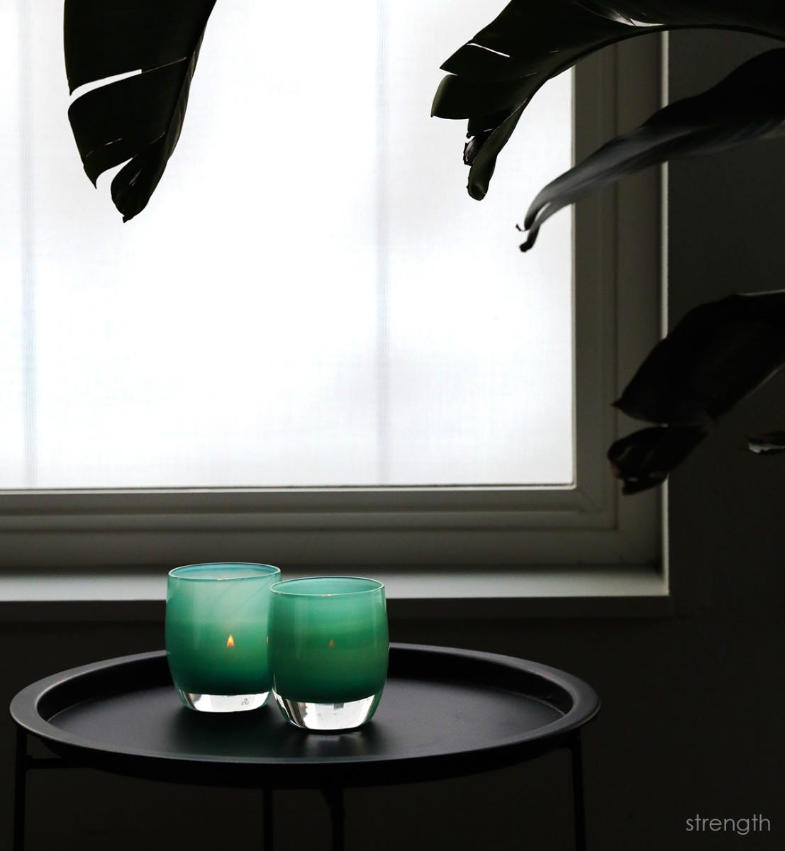 strength teal green hand-blown glass votive candle holder