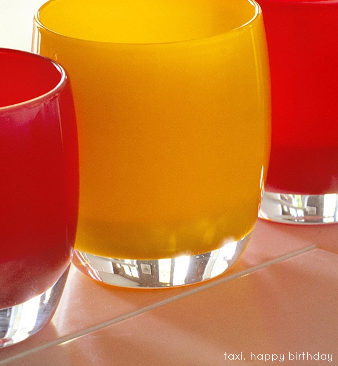 taxi, golden yellow, hand-blown glass votive candle holder. Paired with happy birthday.