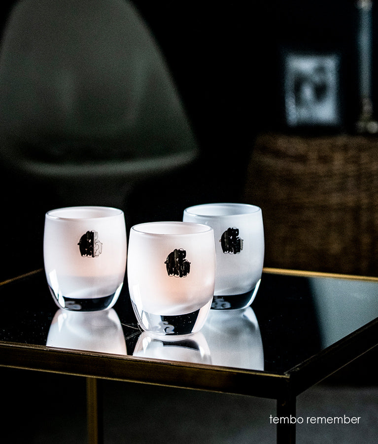 tembo remember little silver elephants on white, hand-blown glass votive candle holder