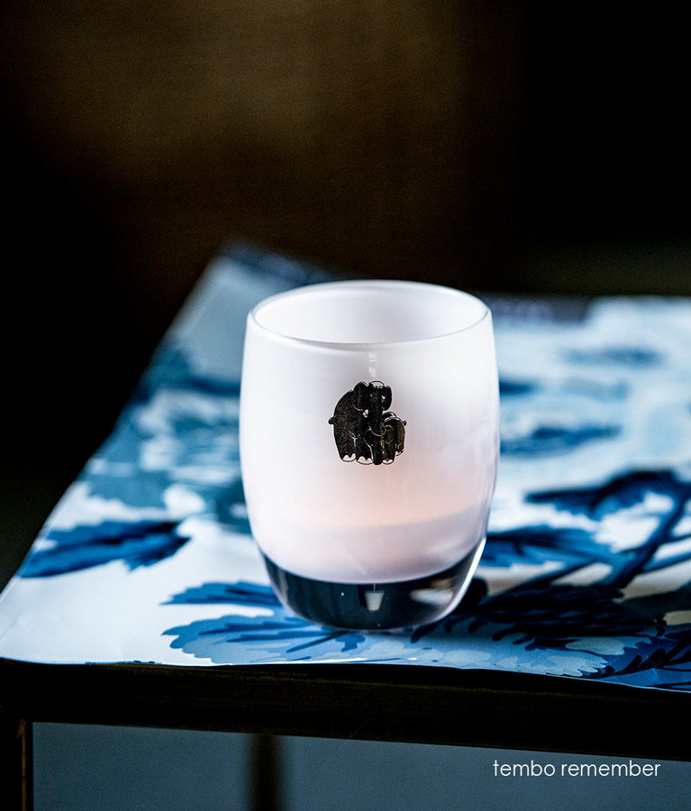 tembo remember little silver elephants on white, hand-blown glass votive candle holder