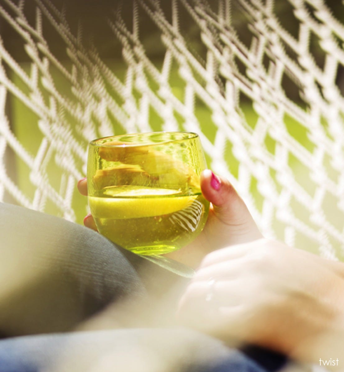 twist drinker, transparent lime green, hand-blown drinking glass.