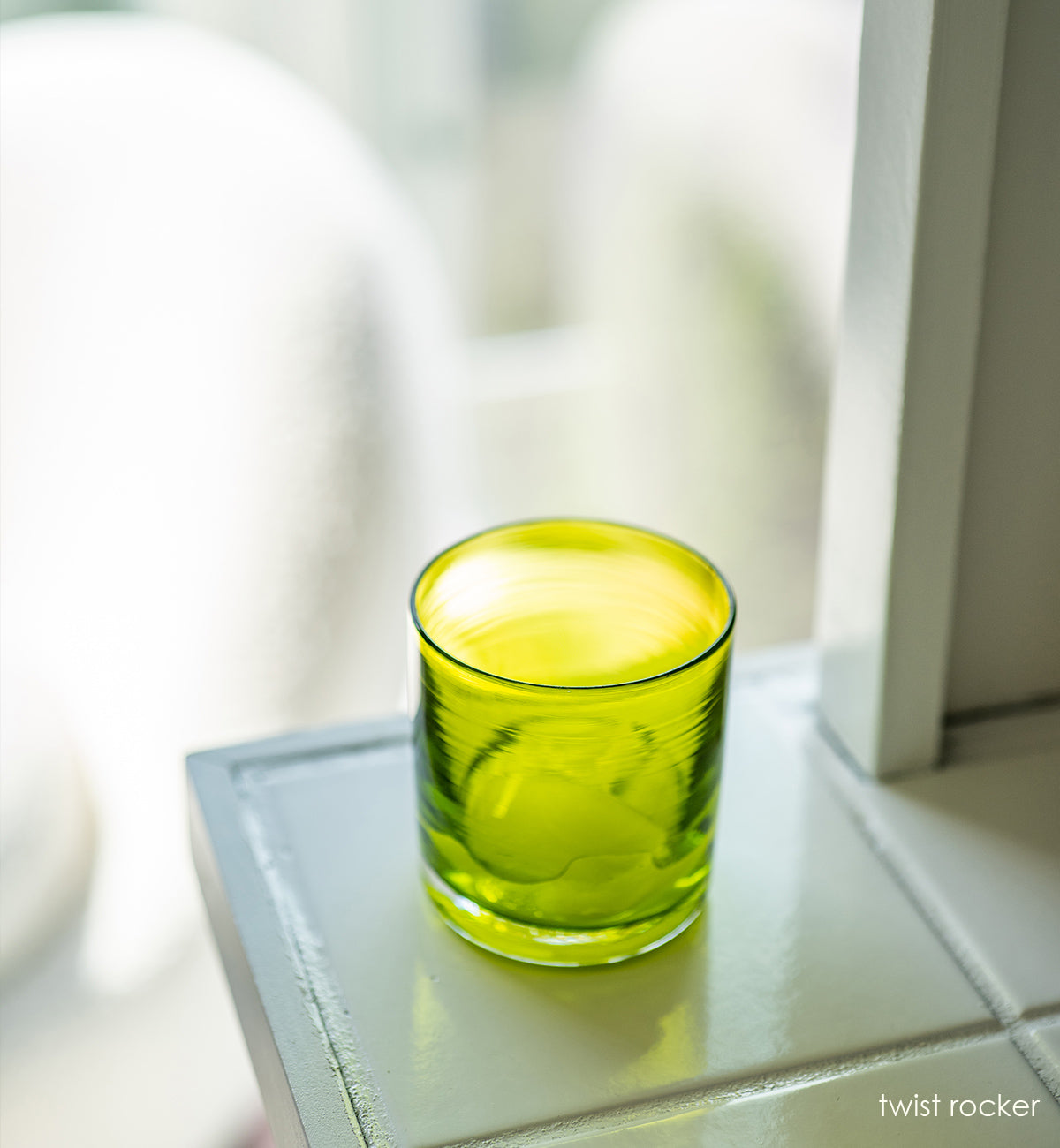 bright green hand-blown lowball glass.