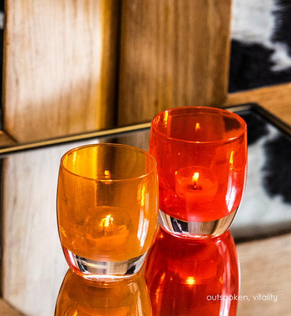 vitality, bright blood-orange, hand-blown glass votive candle holder.